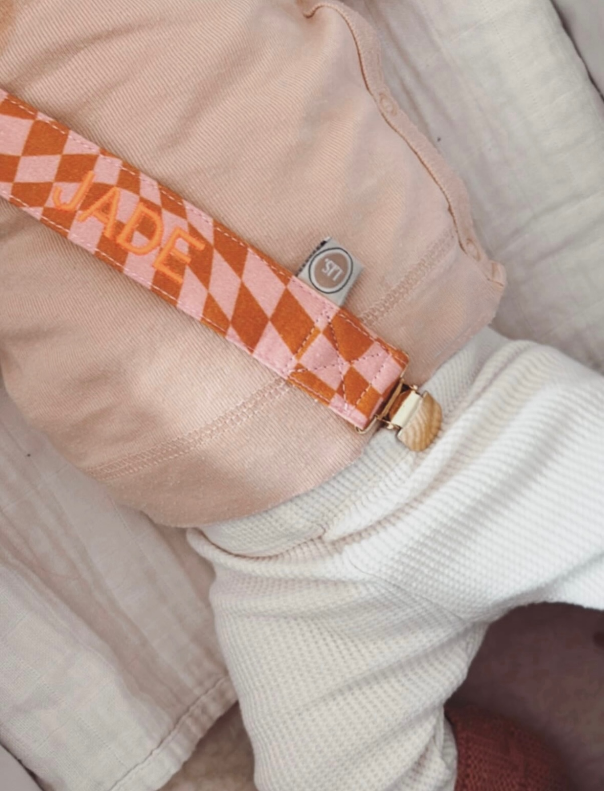 Name des Schnullerkabels – Rosa/Orange